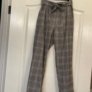 Plaid pants black, red,and gray ruffle waisted NWT. No holes,stains, or piling